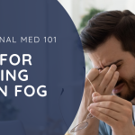Image of middle aged man rubbing his eyes. Tips for beating brain fog.