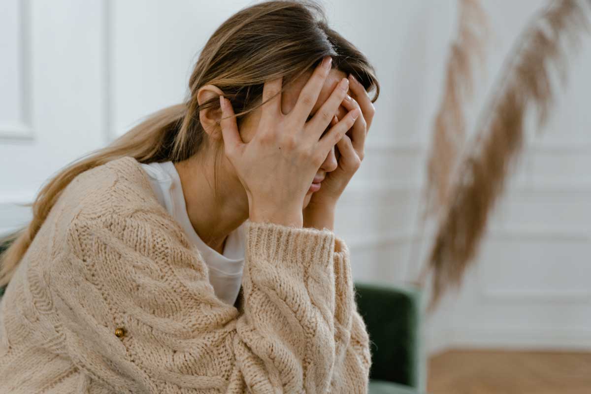 Functional Medicine Approaches for Balancing Hormones and Improving Vitality 2 A woman experiencing high levels of stress.