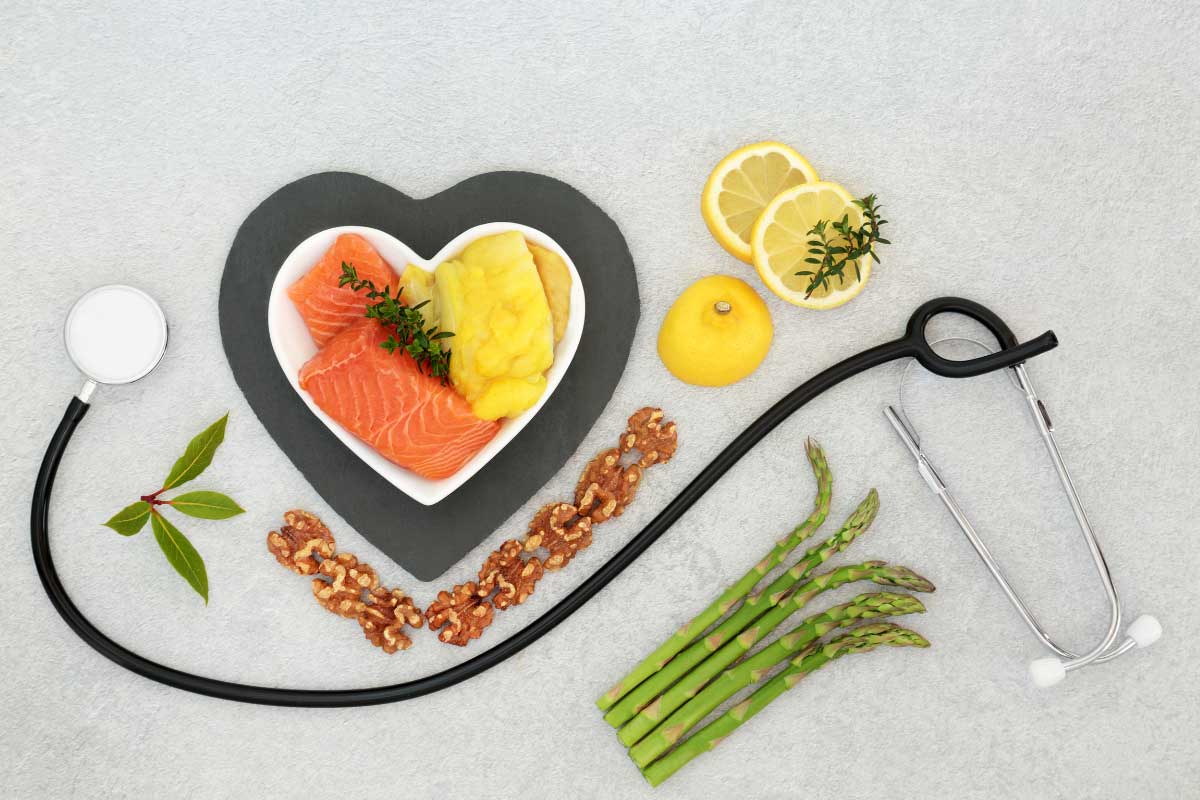 The Truth About Cholesterol and Statins 3 A heart healthy meal dispplayed in a decorative way to form a love heart.
