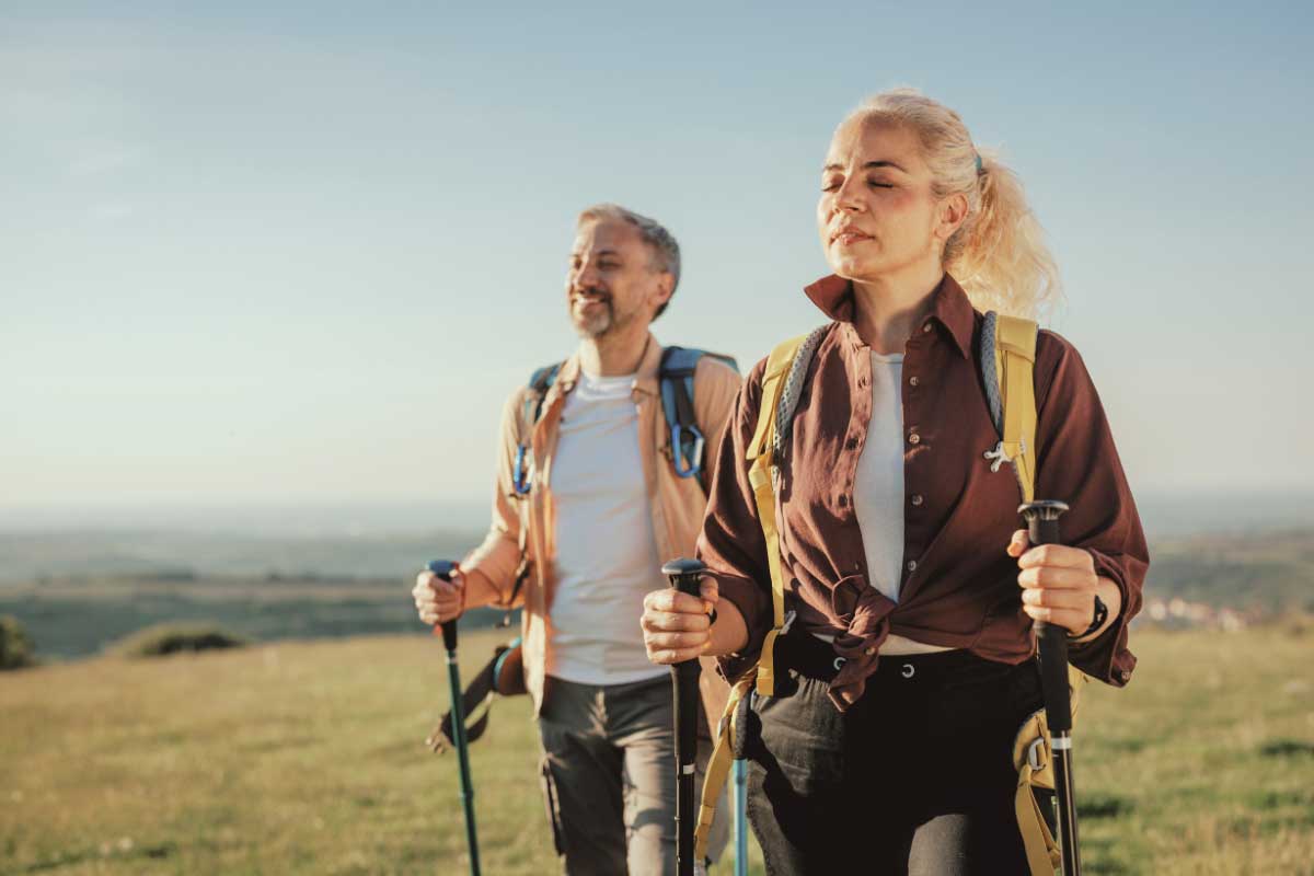 Optimal Health with Functional Medicine 4 A middle-aged couple enjoying a hike.